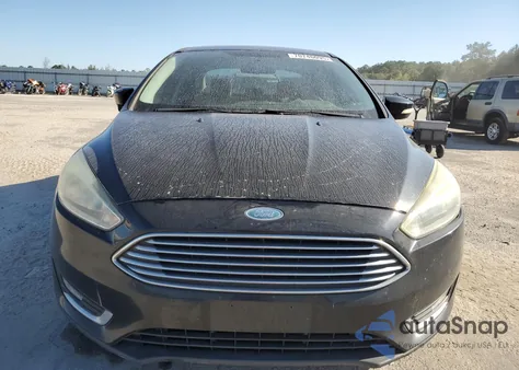 2015 Ford Focus Titanium z USA, uszkodzony, nr VIN 1FADP3J29FL268007